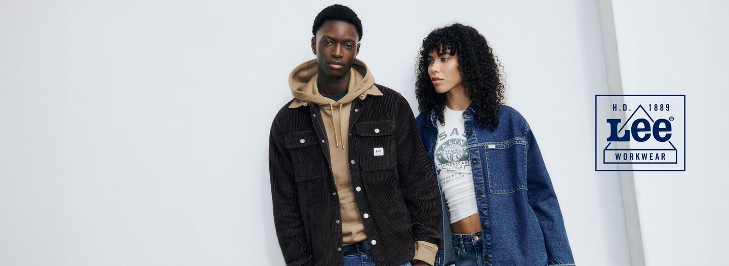 Two models wearing the new Workwear collection with the workwear logo on the side