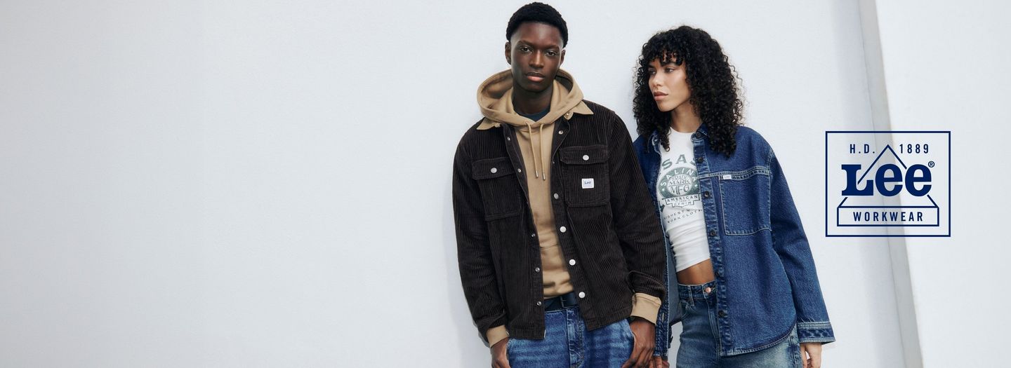 Two models wearing the new Workwear collection with the workwear logo on the side