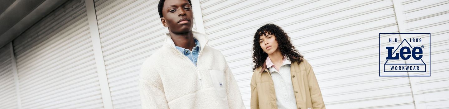 Two models wearing the new Workwear collection with the workwear logo on the side