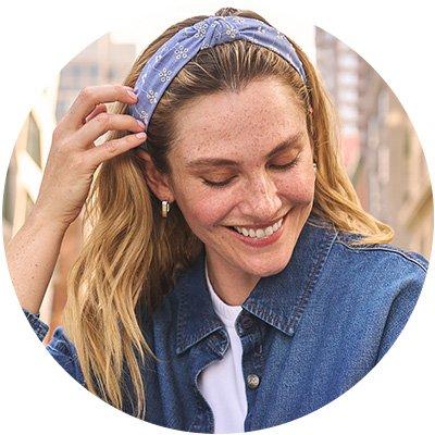 Woman wearing a  Lee x Goody Headband