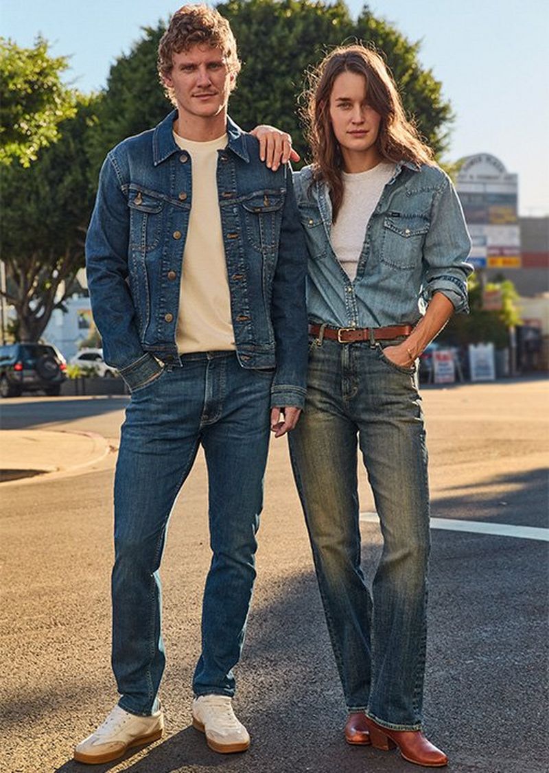 Couple in the city wearing Lee Rider Denim.
