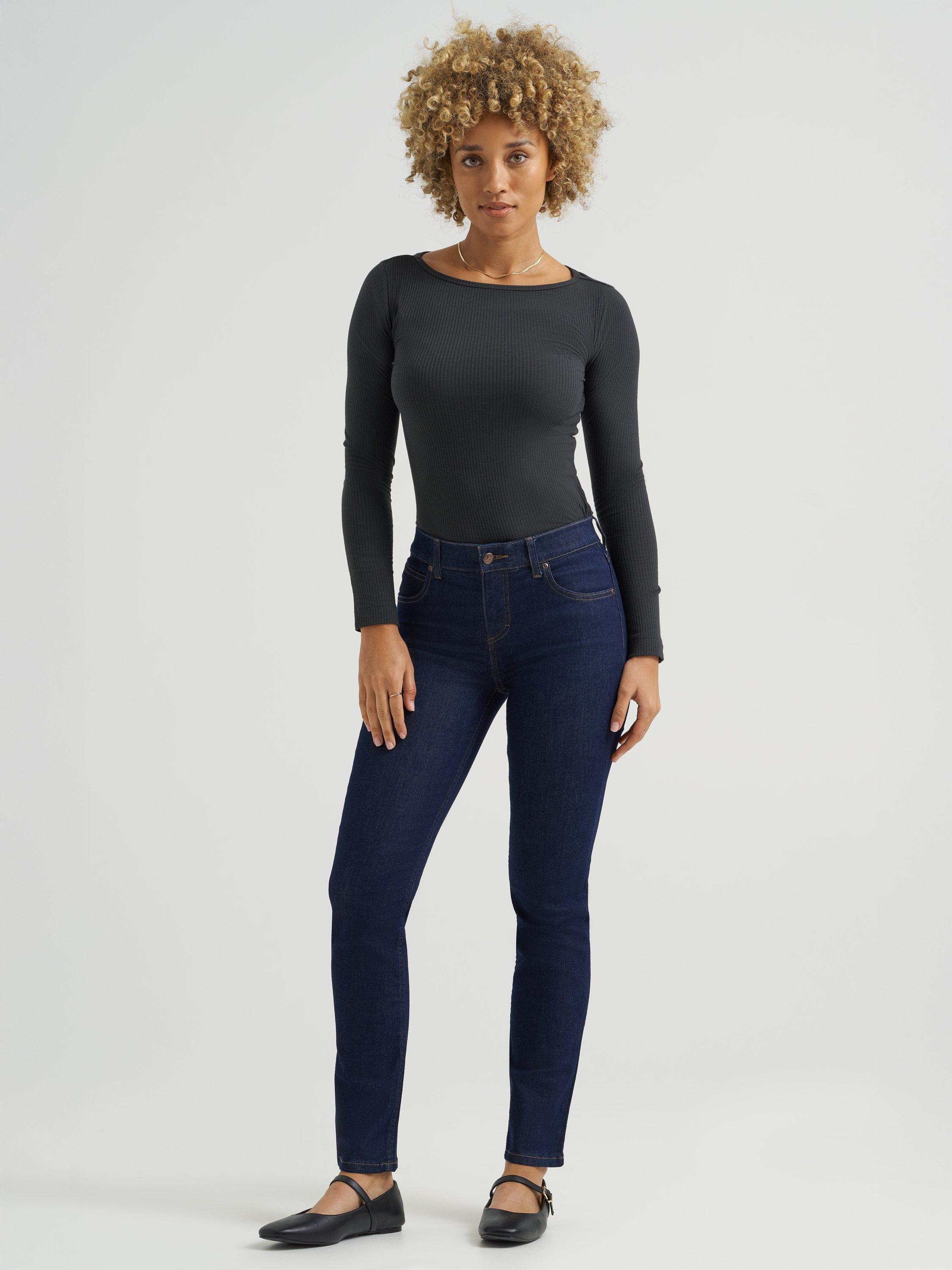 Model wearing size 4 Slim Fit Lee Jeans