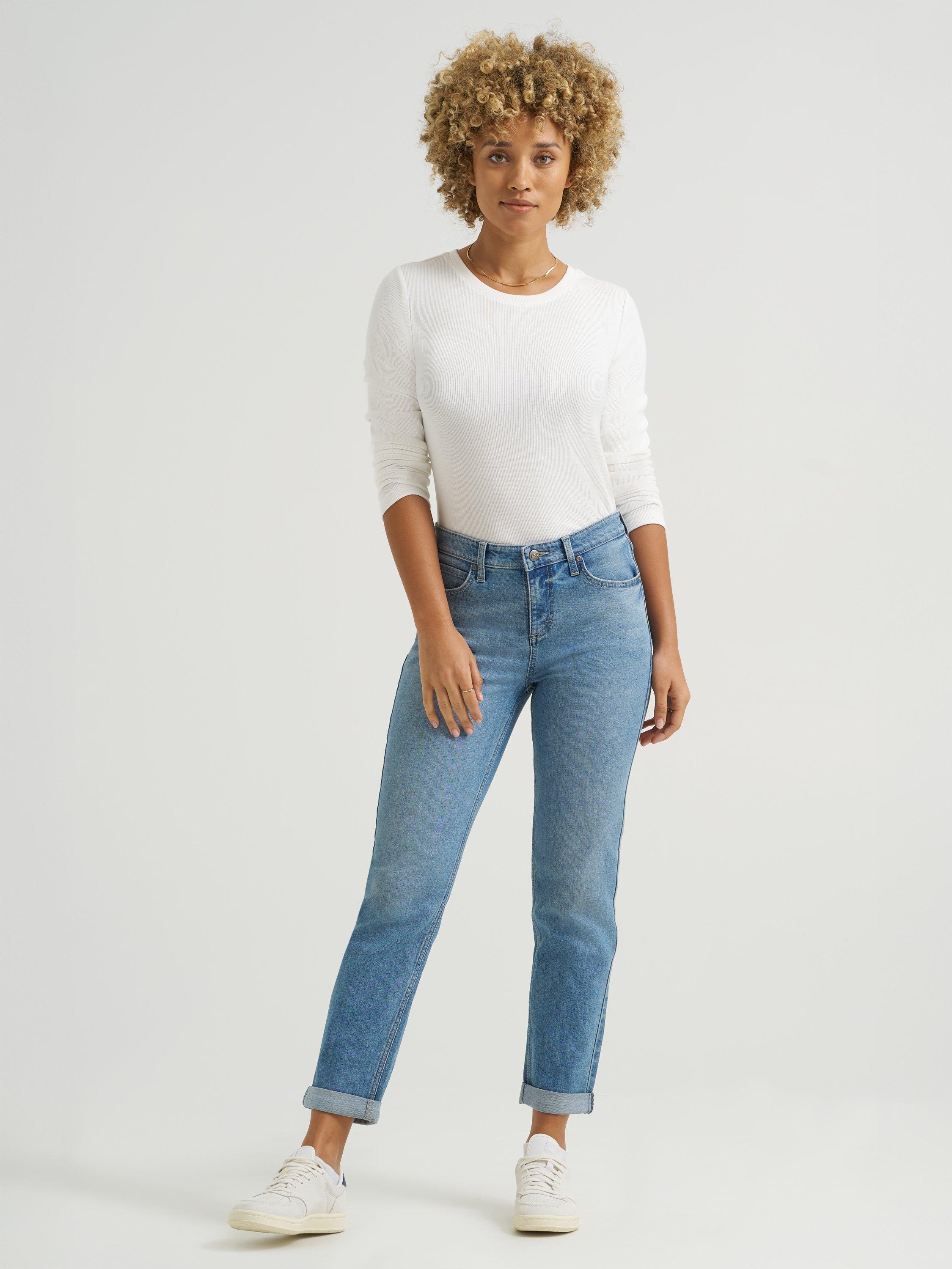Model wearing size 4 Tapered Lee Jeans